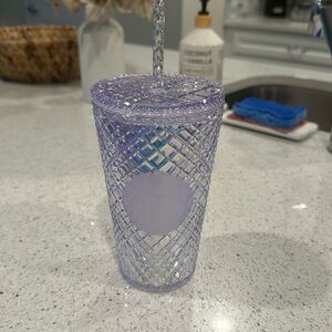 16oz Silver unicorn jeweled Starbucks tumbler.